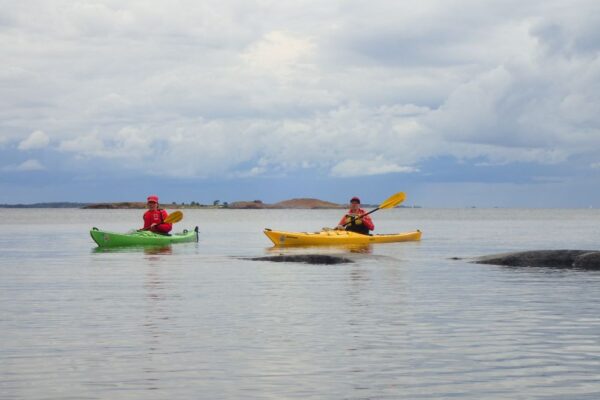 Two paddlers on a cloudy day in the Archipelago Sea